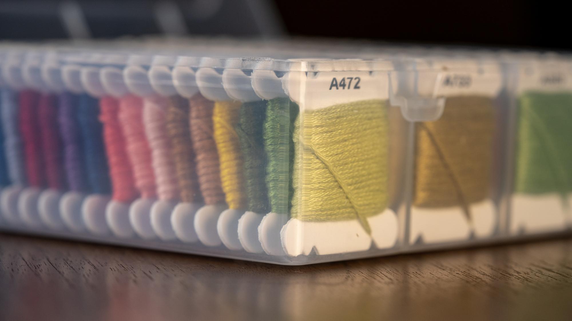 collection of embroidered samples on display